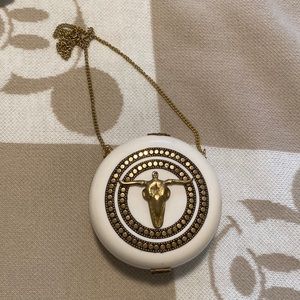 Greek golden minotaur detailed ivory colored clutch/cross body bag